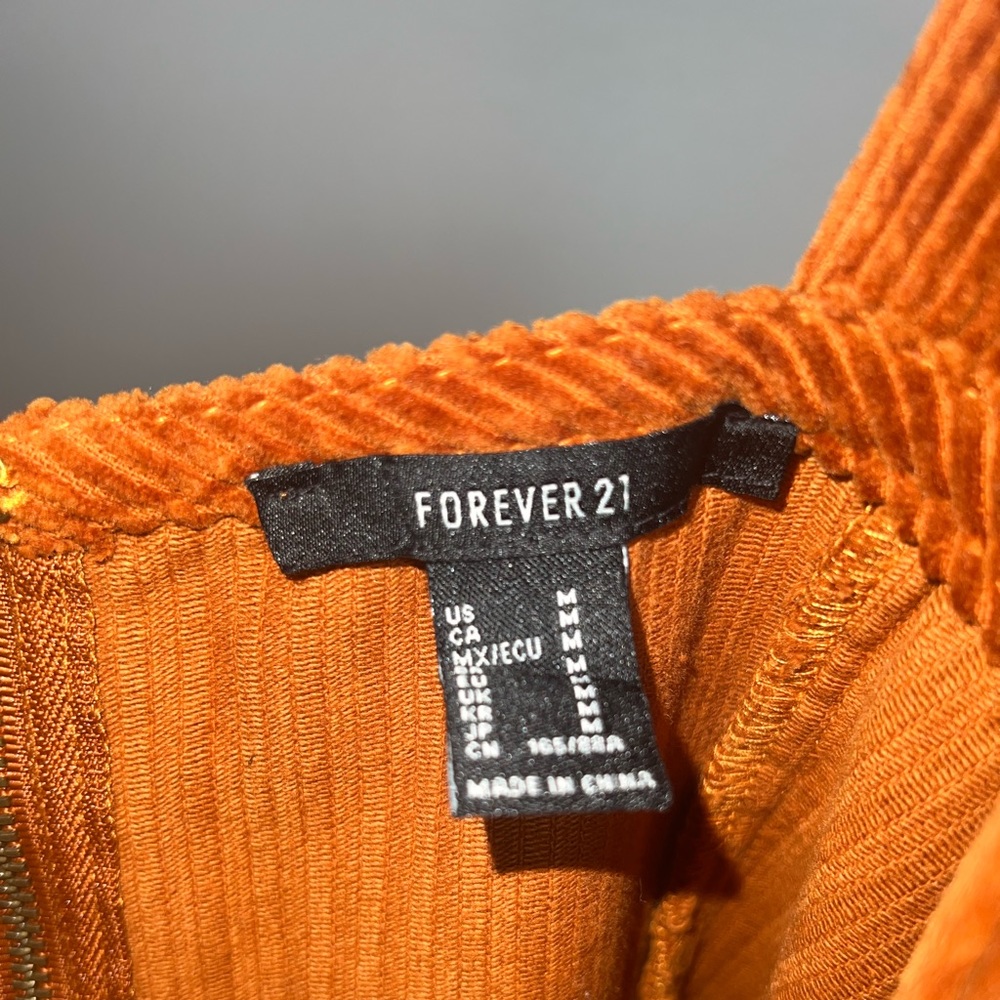 Women’s overall style dress. Orange